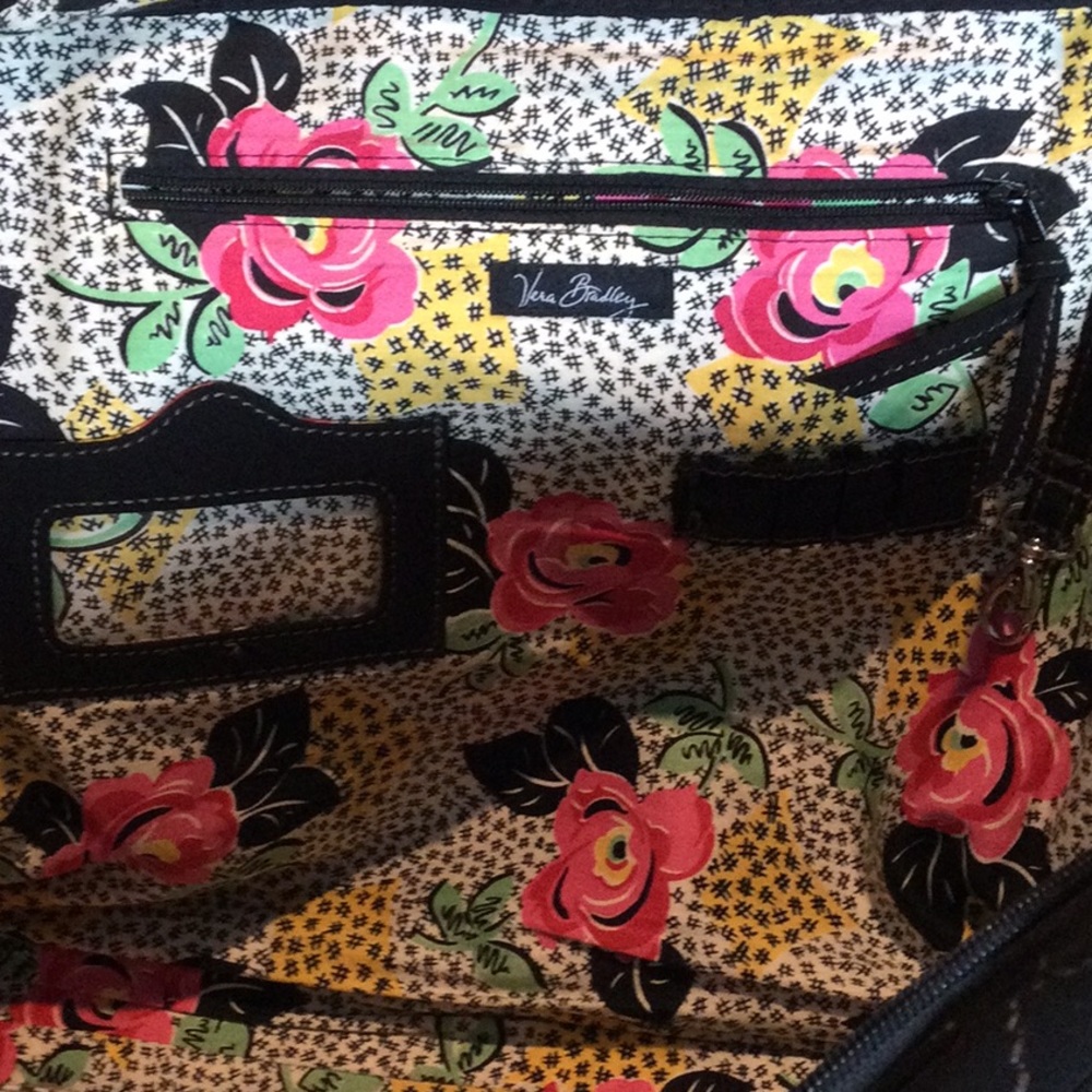 Laptop carry case. Vera Bradley quilted black fabric. Floral interior.